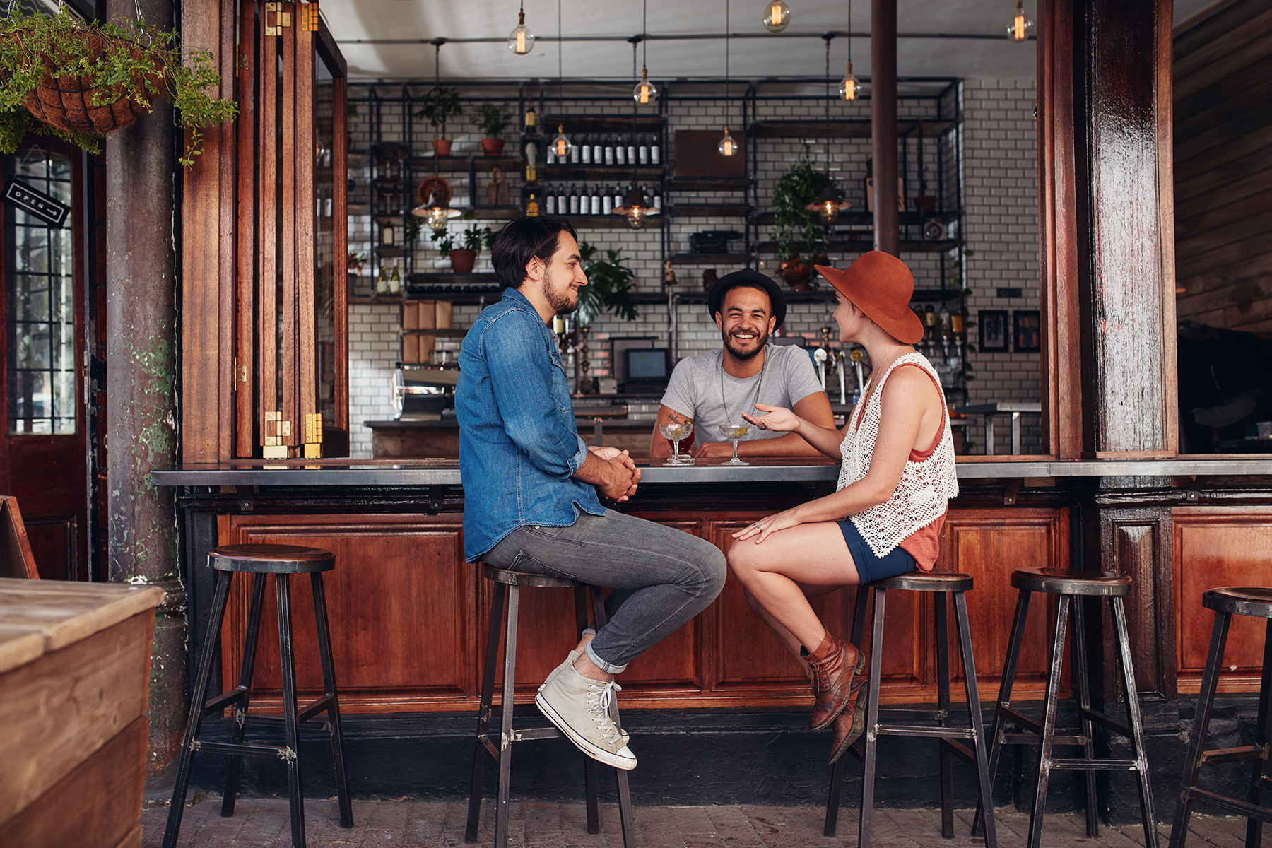 Friends enjoying a drink at local Austin bar